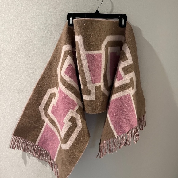 Coach fun collegiate-style scarf in yummy pink and brown tones.